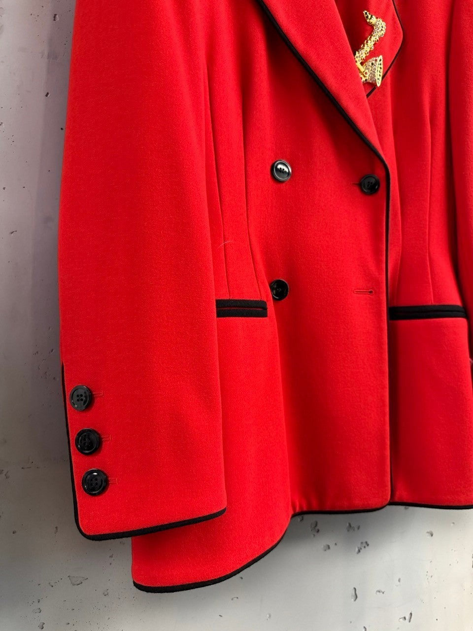 BERLIN VINTAGE CORNER vibrant red wool blend double-breasted blazer with black piping and buttons.