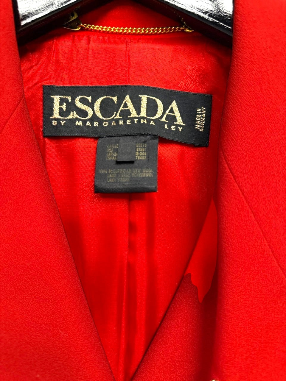 BERLIN VINTAGE CORNER vibrant red wool blend double-breasted blazer with black piping and gold buttons.