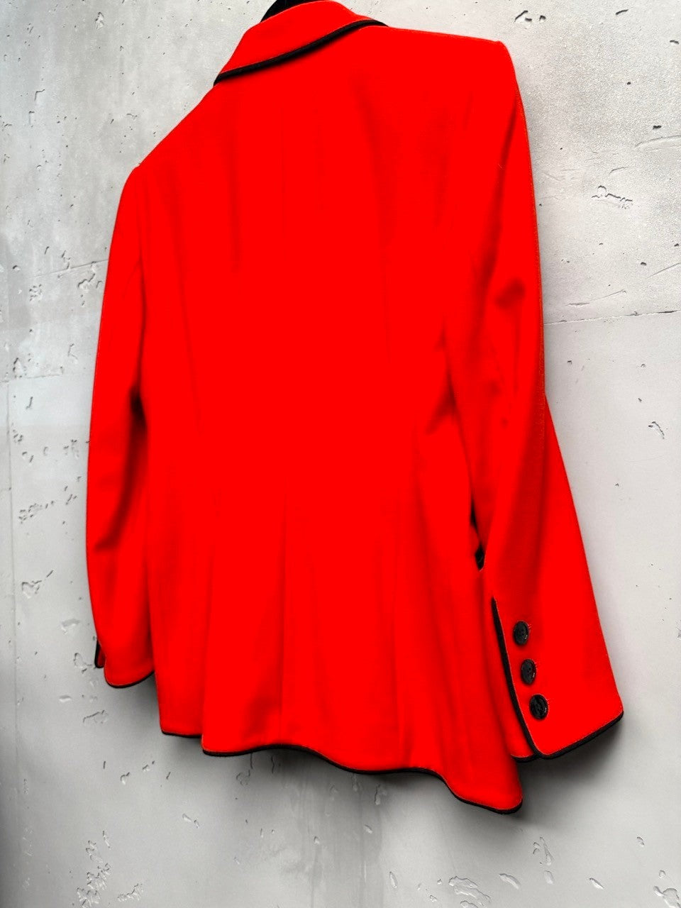 BERLIN VINTAGE CORNER vibrant red wool blend double-breasted blazer with black piping and button details.
