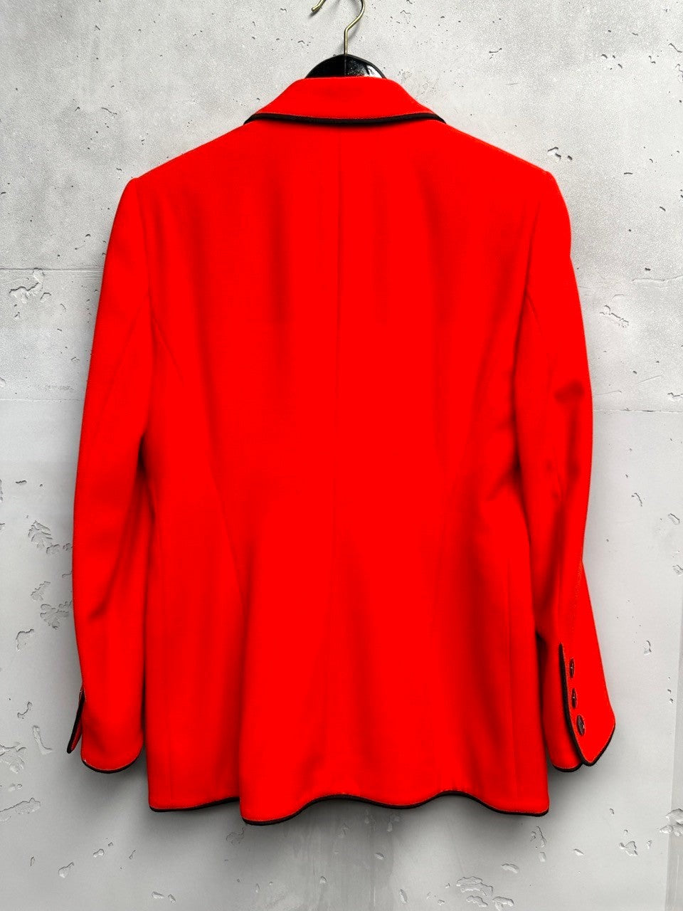 BERLIN VINTAGE CORNER vibrant red wool blend double-breasted blazer with black piping and button details.