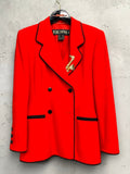 BERLIN VINTAGE CORNER vibrant red wool blend double-breasted blazer with black piping and saxophone brooch.