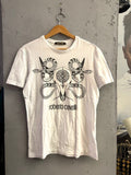 BERLIN VINTAGE CORNER white Roberto Cavalli cotton t-shirt with black graphic snake and skull print on a wooden hanger
