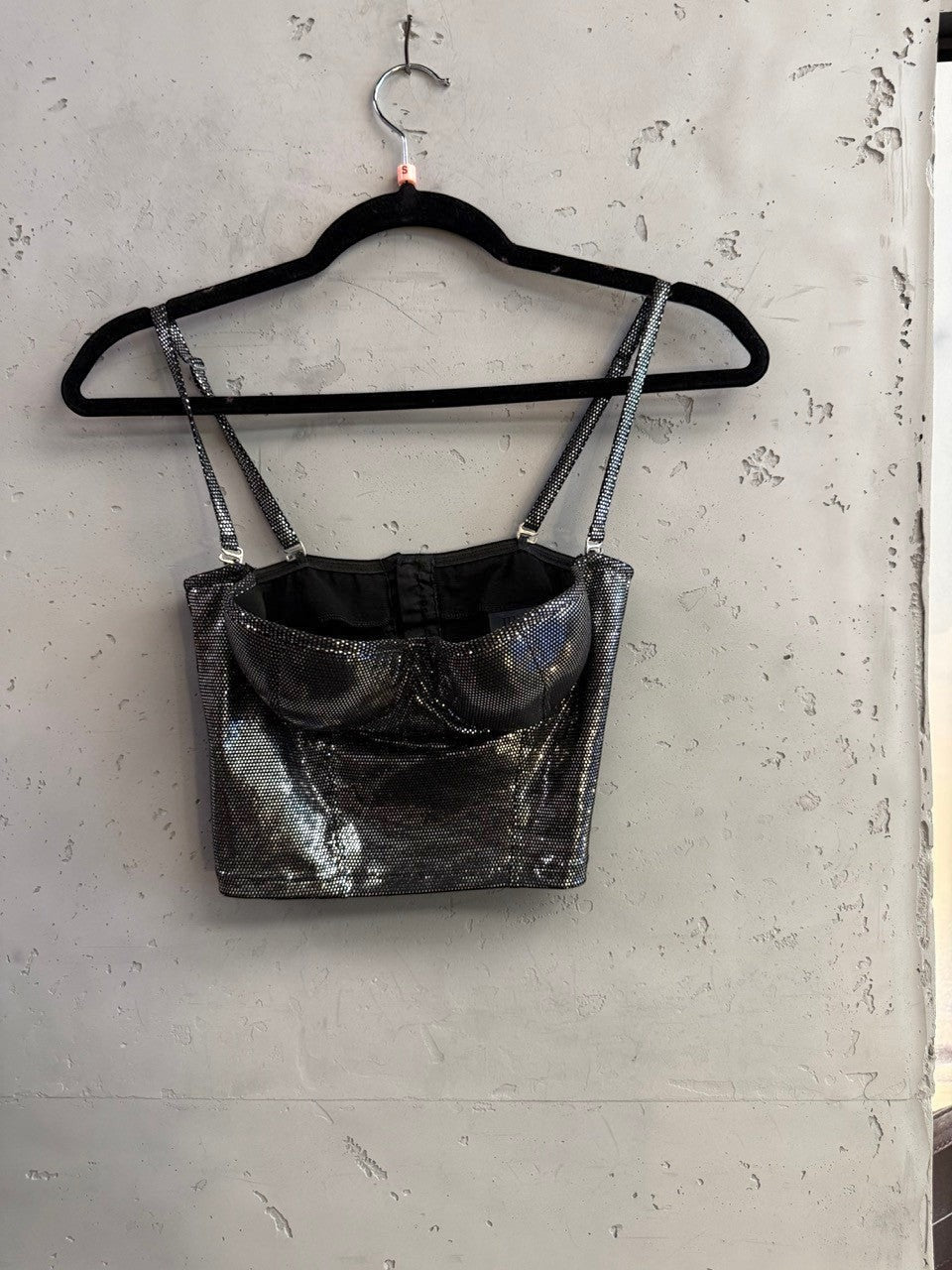 BERLIN VINTAGE CORNER roccobarocco metallic silver corset crop top with adjustable spaghetti straps on a hanger