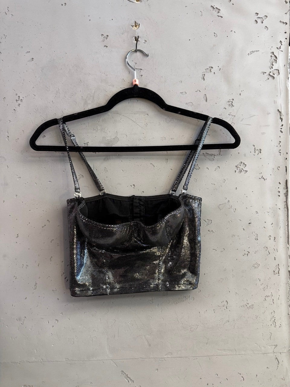 BERLIN VINTAGE CORNER roccobarocco metallic silver corset crop top with adjustable spaghetti straps on a hanger