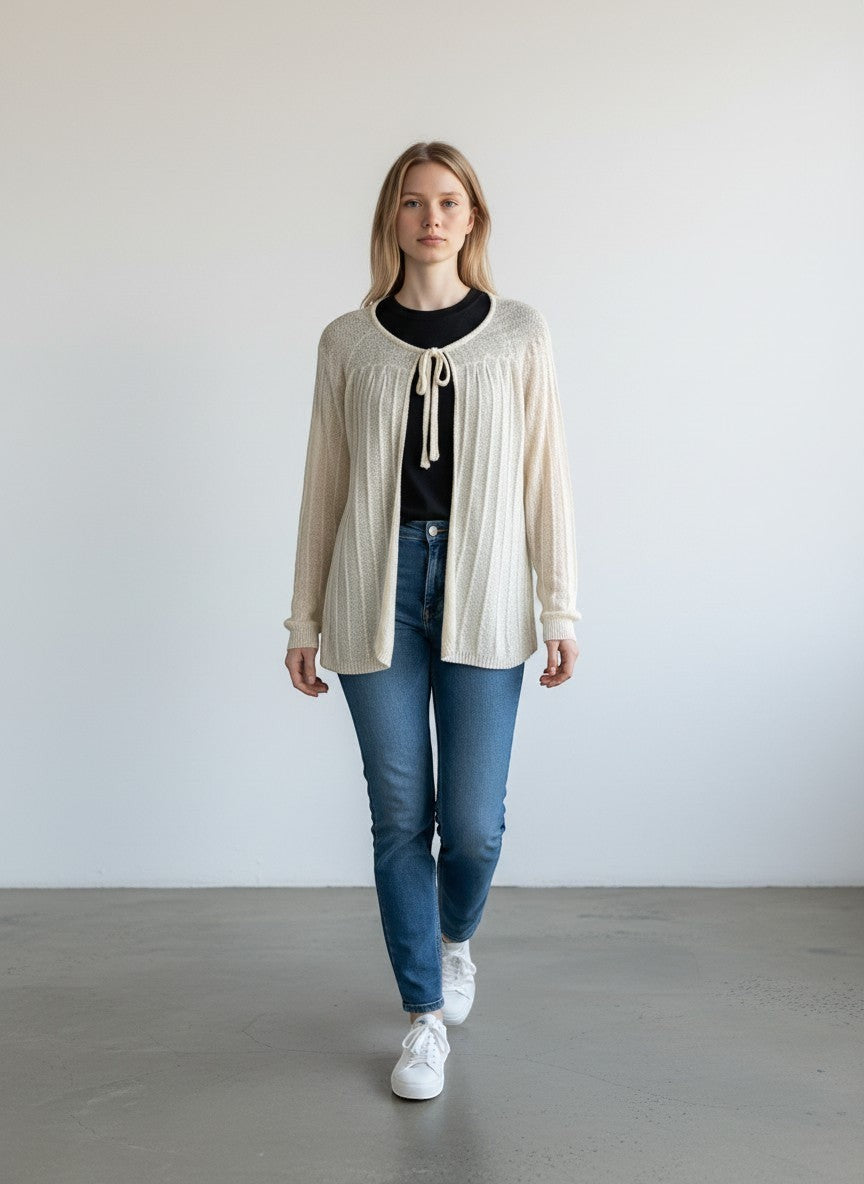 BERLIN VINTAGE CORNER off-white sheer knit long sleeve cardigan with tie neck detail and vertical ribbing.
