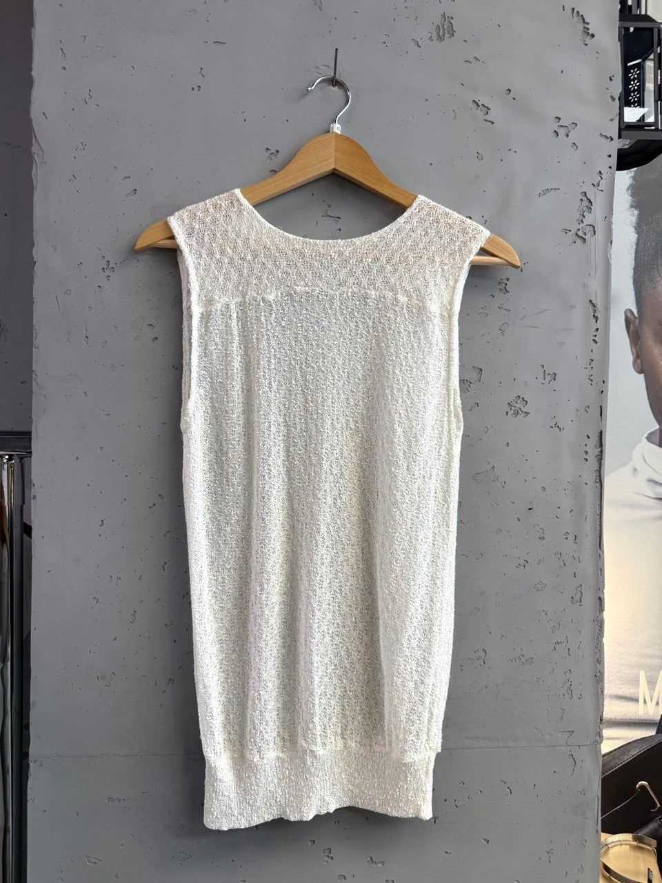 BERLIN VINTAGE CORNER off-white sheer knit sleeveless top with crew neckline and textured fabric.