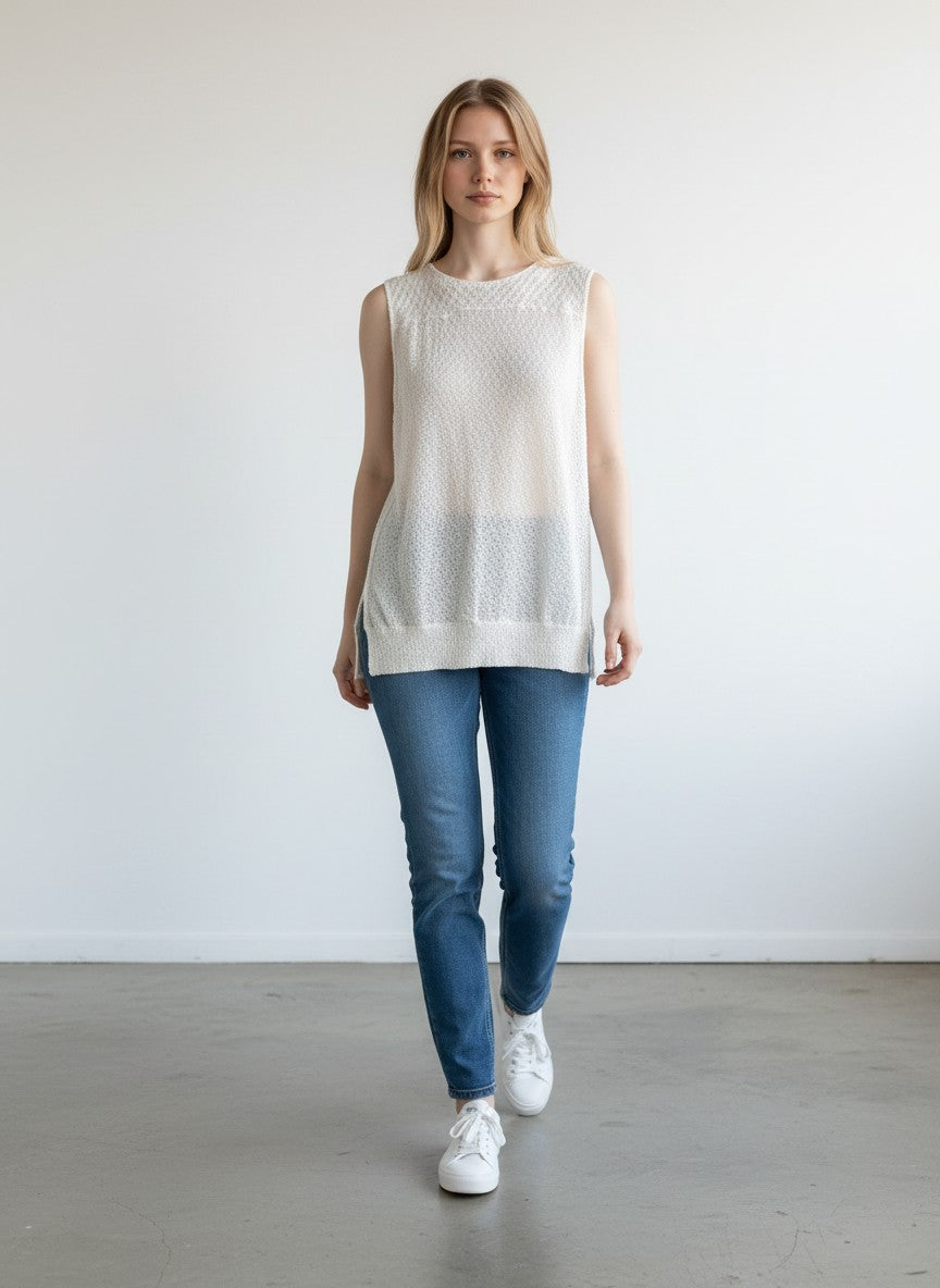 BERLIN VINTAGE CORNER off-white sheer knit sleeveless crew neck top with a relaxed fit and textured open-knit construction.