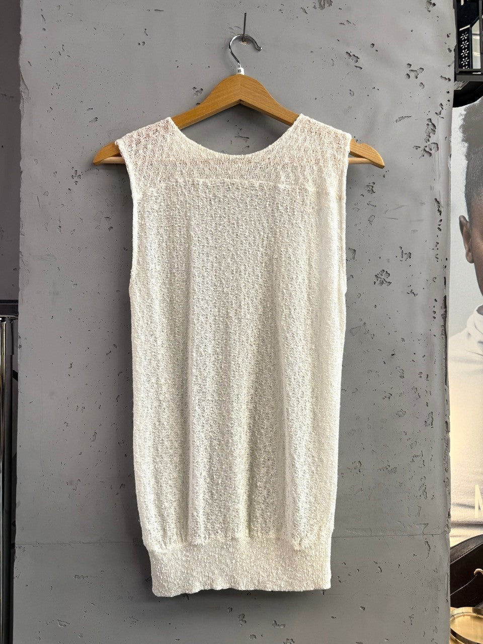 BERLIN VINTAGE CORNER off-white sheer knit sleeveless top with crew neckline and textured fabric.