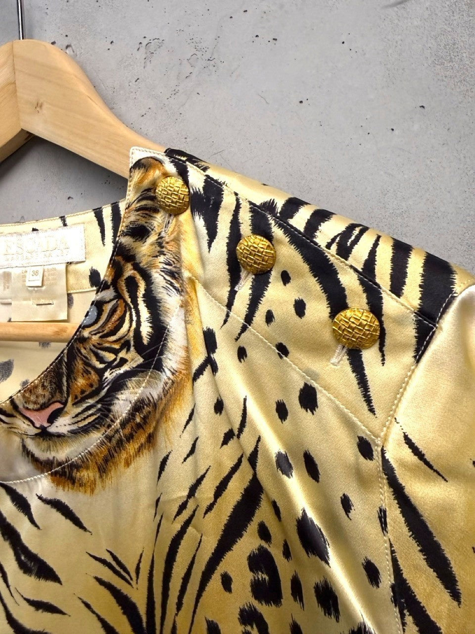 BERLIN VINTAGE CORNER silk blouse with a bold tiger and leopard print in yellow and black, featuring gold-tone shoulder buttons.