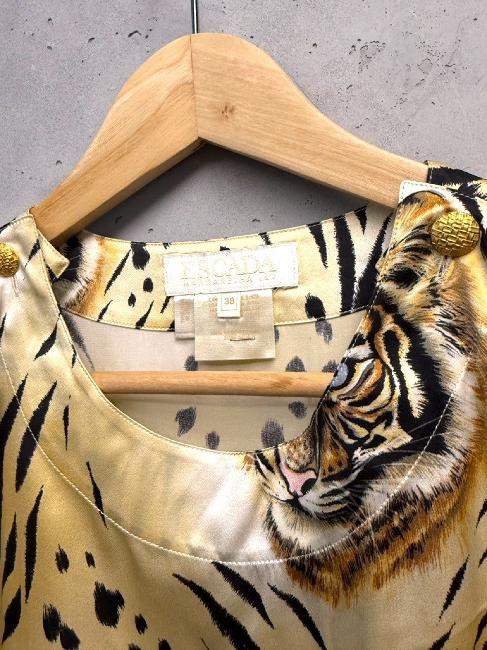 BERLIN VINTAGE CORNER silk animal print blouse with tiger and leopard motifs, gold-tone shoulder buttons.