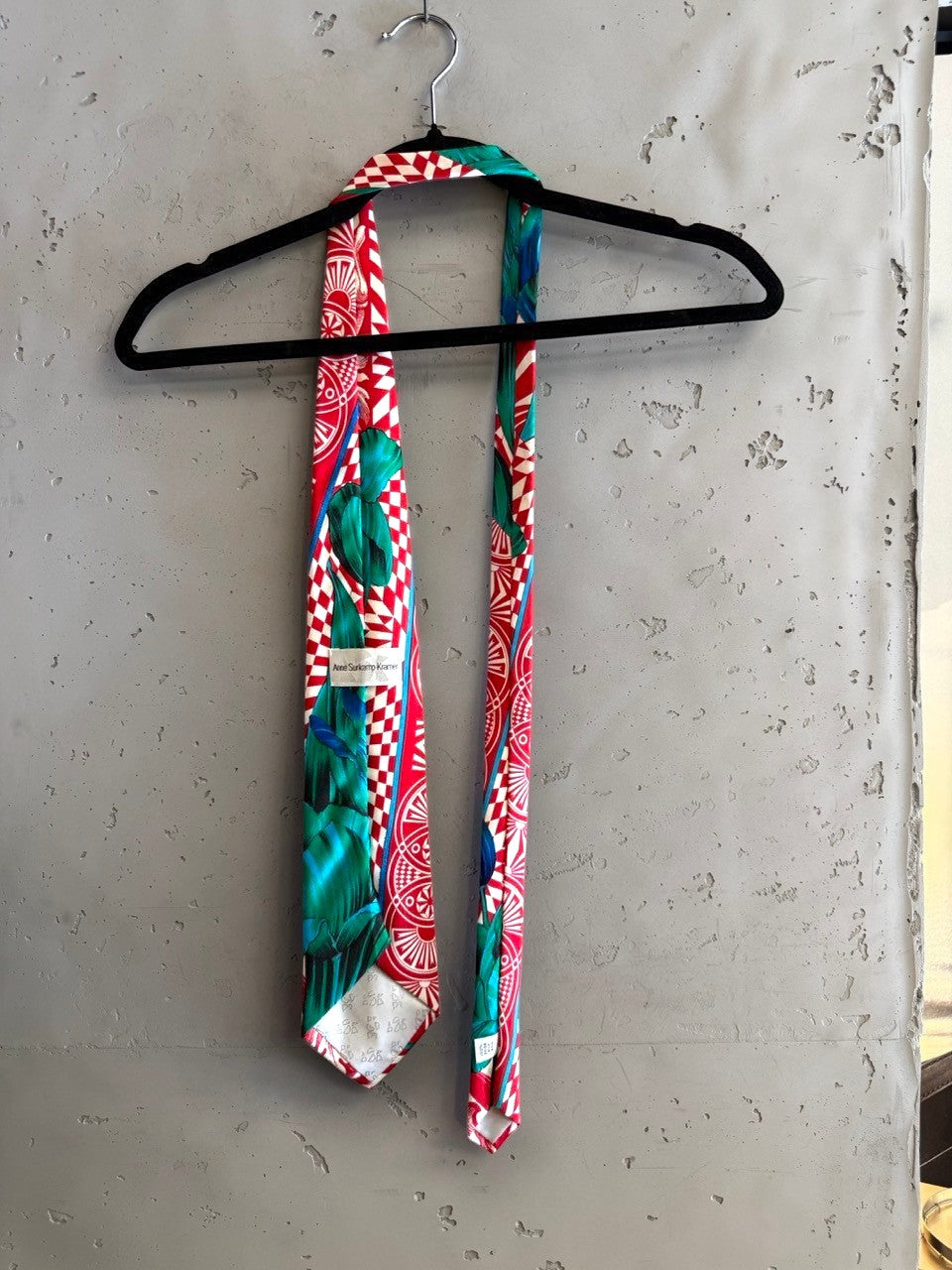 BERLIN VINTAGE CORNER Anne Surkamp Kramer silk necktie featuring red, teal, and white geometric and botanical patterns.