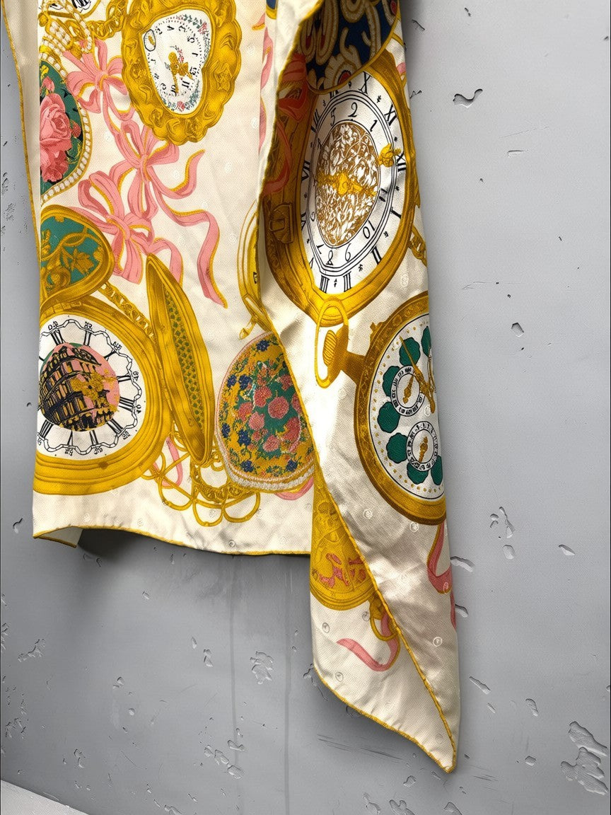 BERLIN VINTAGE CORNER cream silk scarf with pocket watch, floral, and ribbon print. Luxurious accessory with a smooth finish.