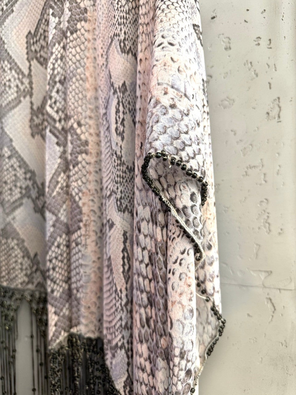 BERLIN VINTAGE CORNER grey, white, and blush pink snakeskin print kimono with beaded trim and fringe.