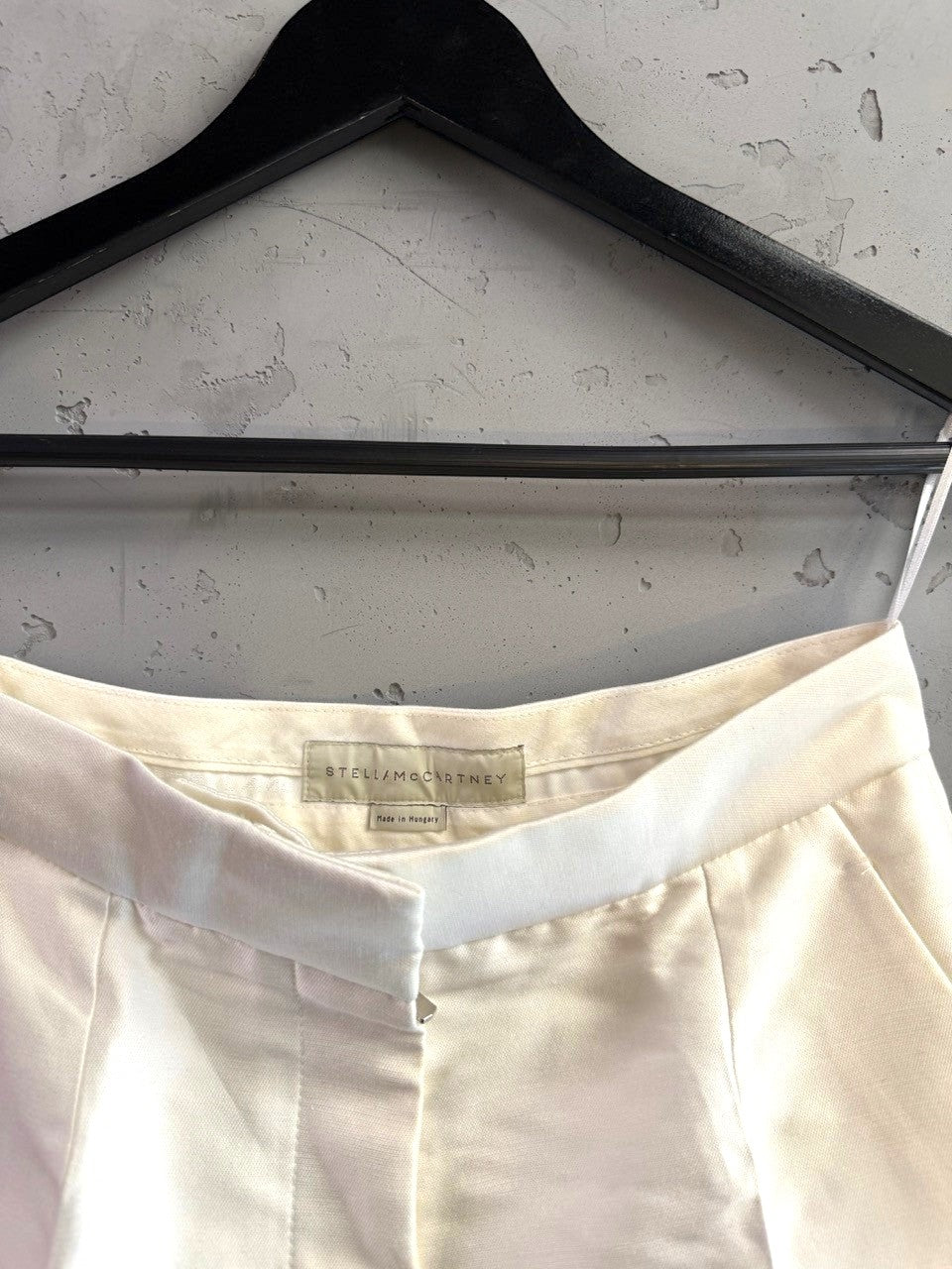BERLIN VINTAGE CORNER Stella McCartney off-white tailored trousers with structured waistband and internal label.
