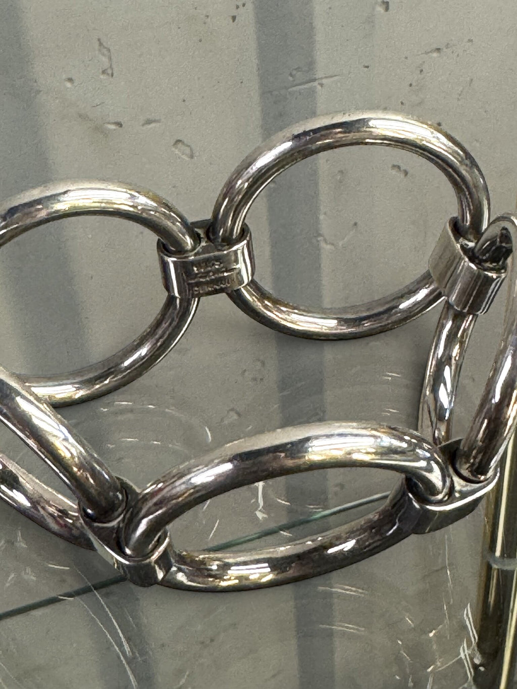 BERLIN VINTAGE CORNER sterling silver bracelet featuring sculptural interconnected circular links with a polished finish.