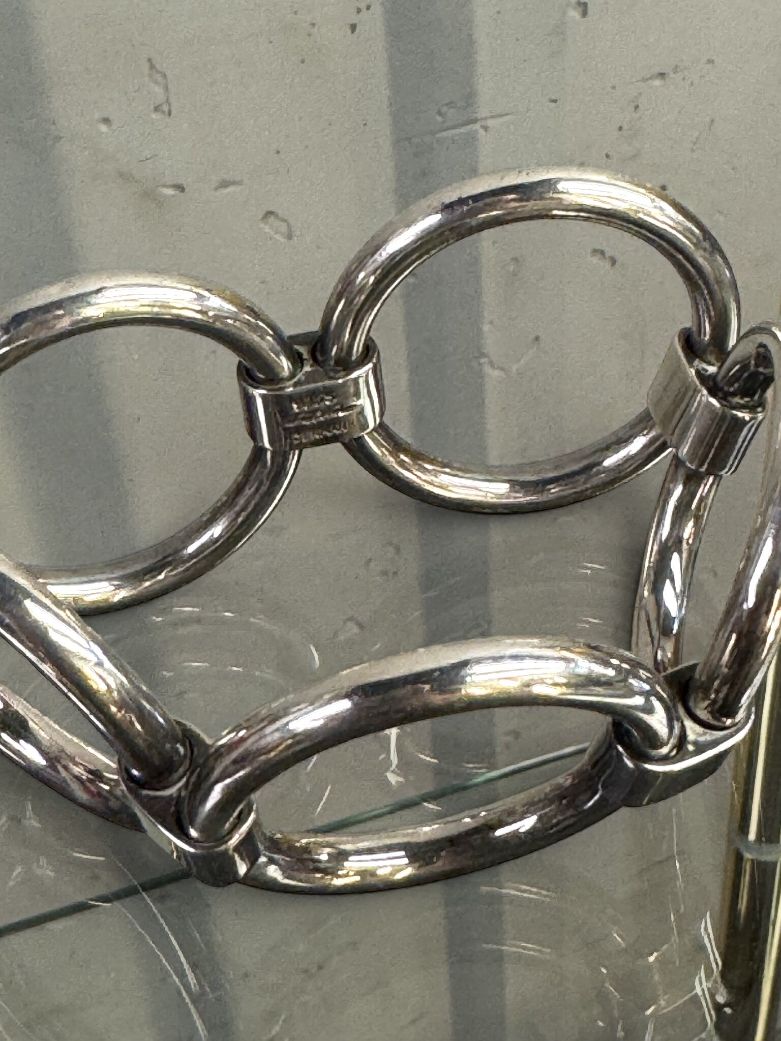BERLIN VINTAGE CORNER sterling silver bracelet featuring sculptural interconnected circular links with a polished finish.