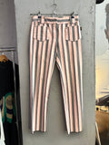 BERLIN VINTAGE CORNER pink, charcoal grey, and black striped cotton pants with a classic waistband and belt loops.