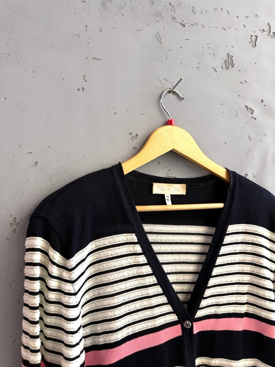 BERLIN VINTAGE CORNER navy, cream, and pink striped knit V-neck cardigan with button front.