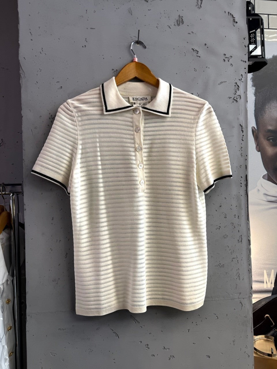 BERLIN VINTAGE CORNER cream knit polo shirt with horizontal stripes, black trim on collar and cuffs.