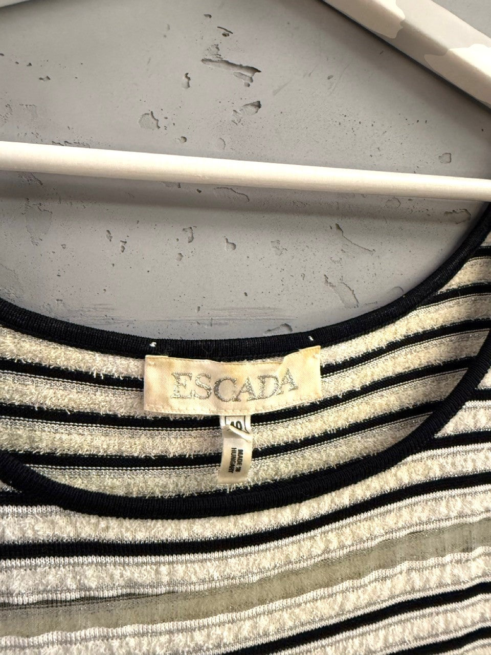 BERLIN VINTAGE CORNER black, white, and grey striped knit tank top with sheer detail across the chest.