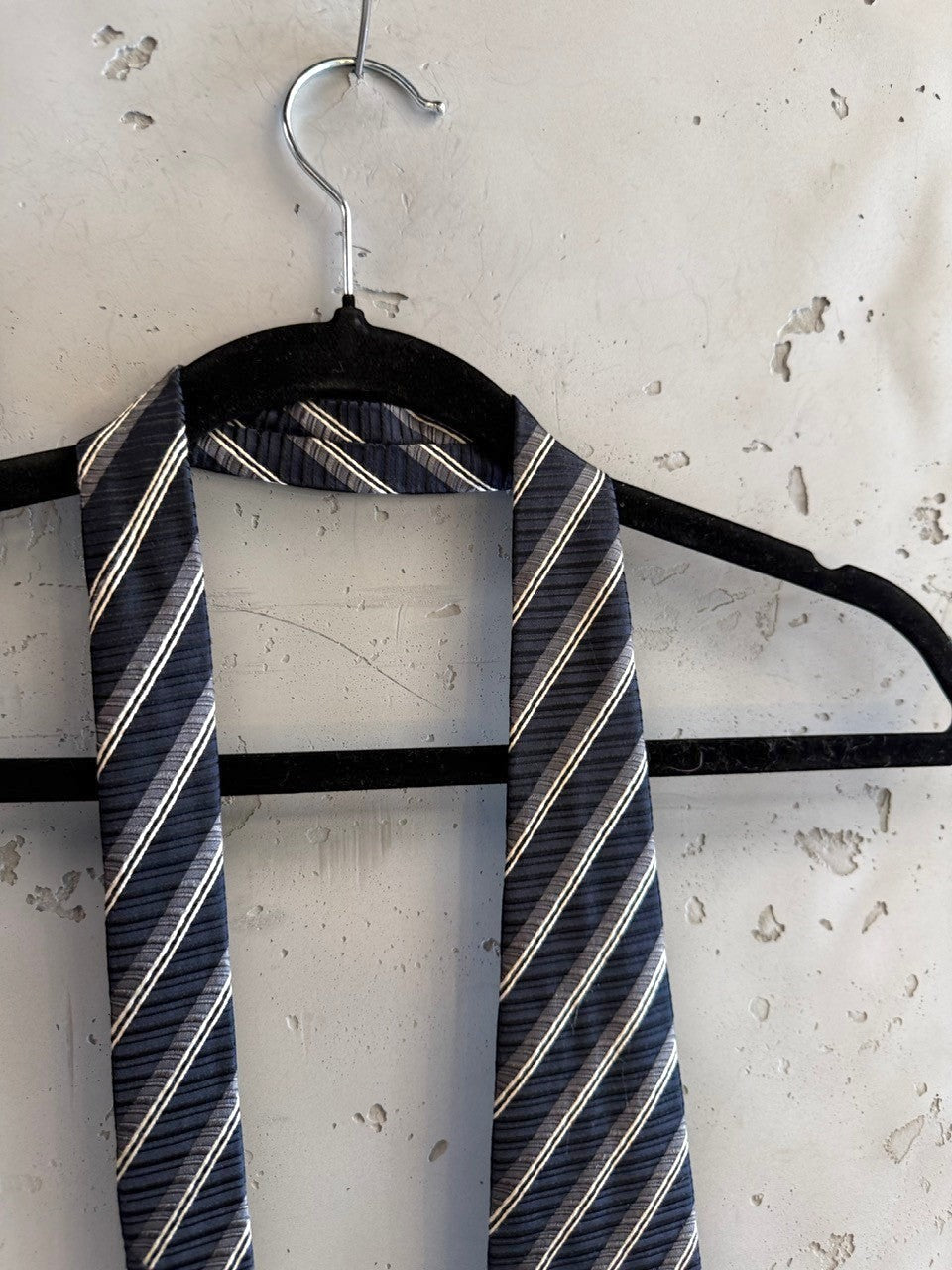 BERLIN VINTAGE CORNER navy, charcoal, and white striped silk necktie. Classic diagonal stripe pattern.