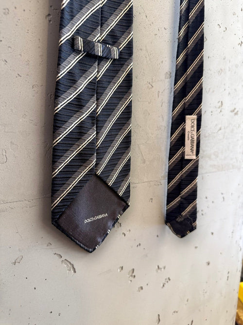 BERLIN VINTAGE CORNER navy, charcoal grey, and white striped silk necktie with Dolce & Gabbana logo.