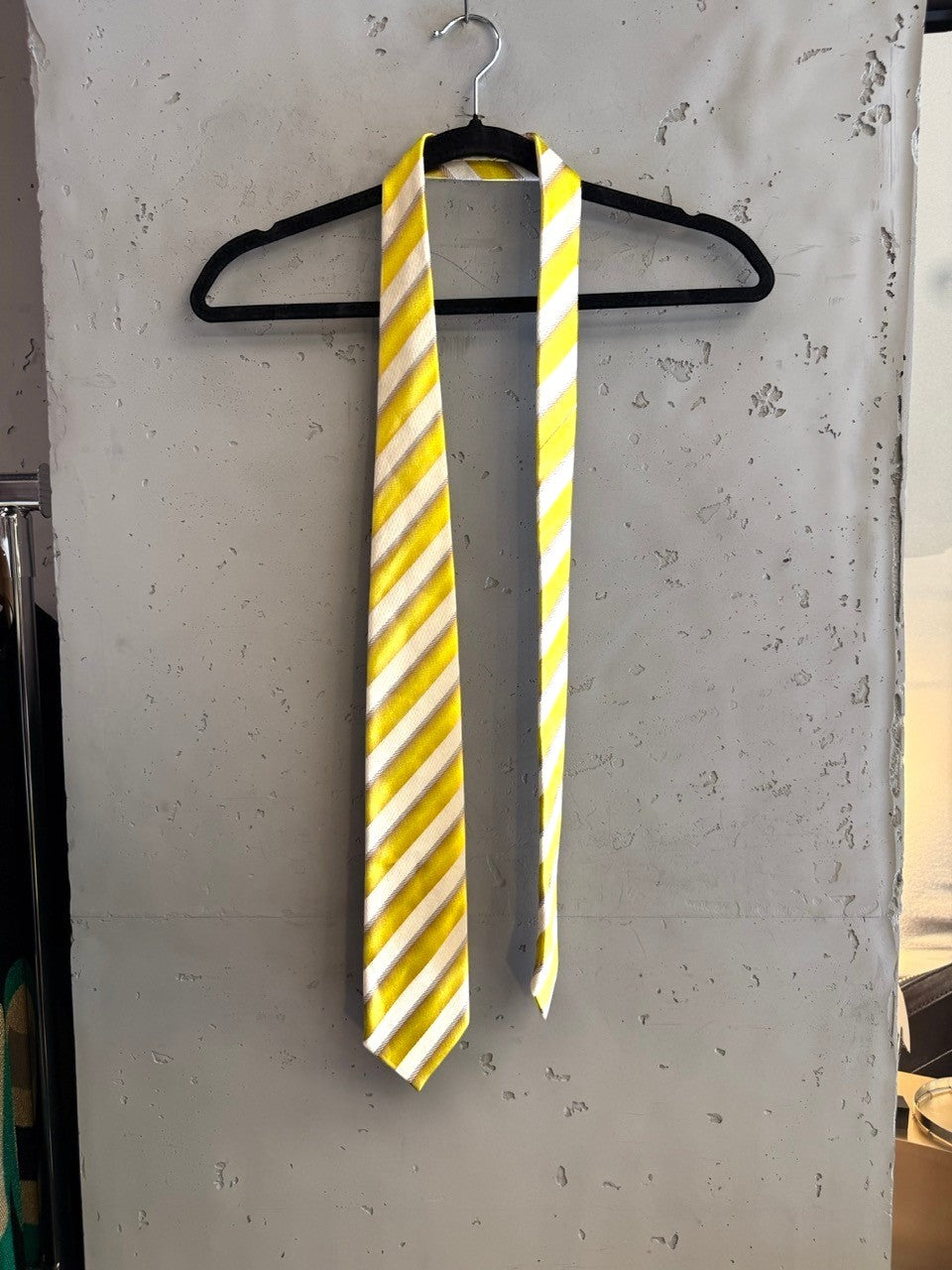 BERLIN VINTAGE CORNER yellow, white, and grey striped silk necktie with a subtle sheen.