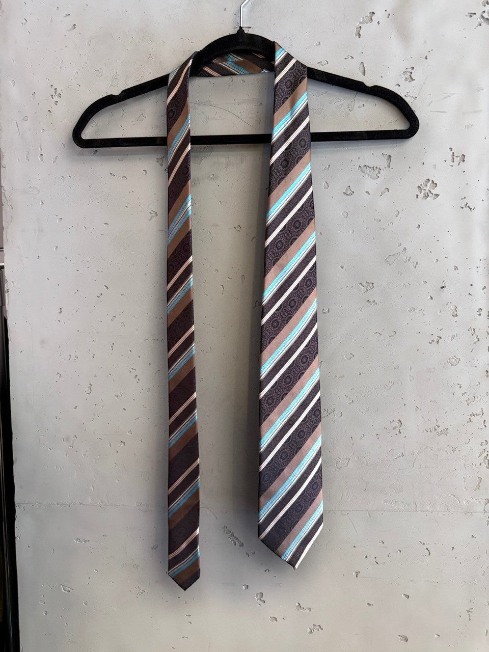 BERLIN VINTAGE CORNER brown, white, and turquoise silk tie with diagonal stripes and paisley detail.