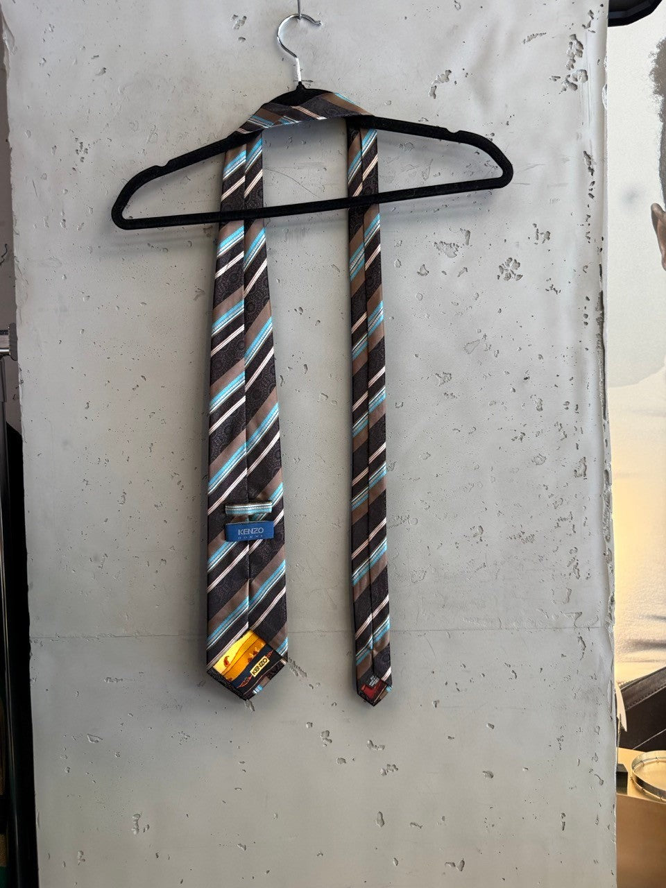 BERLIN VINTAGE CORNER brown, white, and turquoise striped silk tie with paisley detail. Classic width.