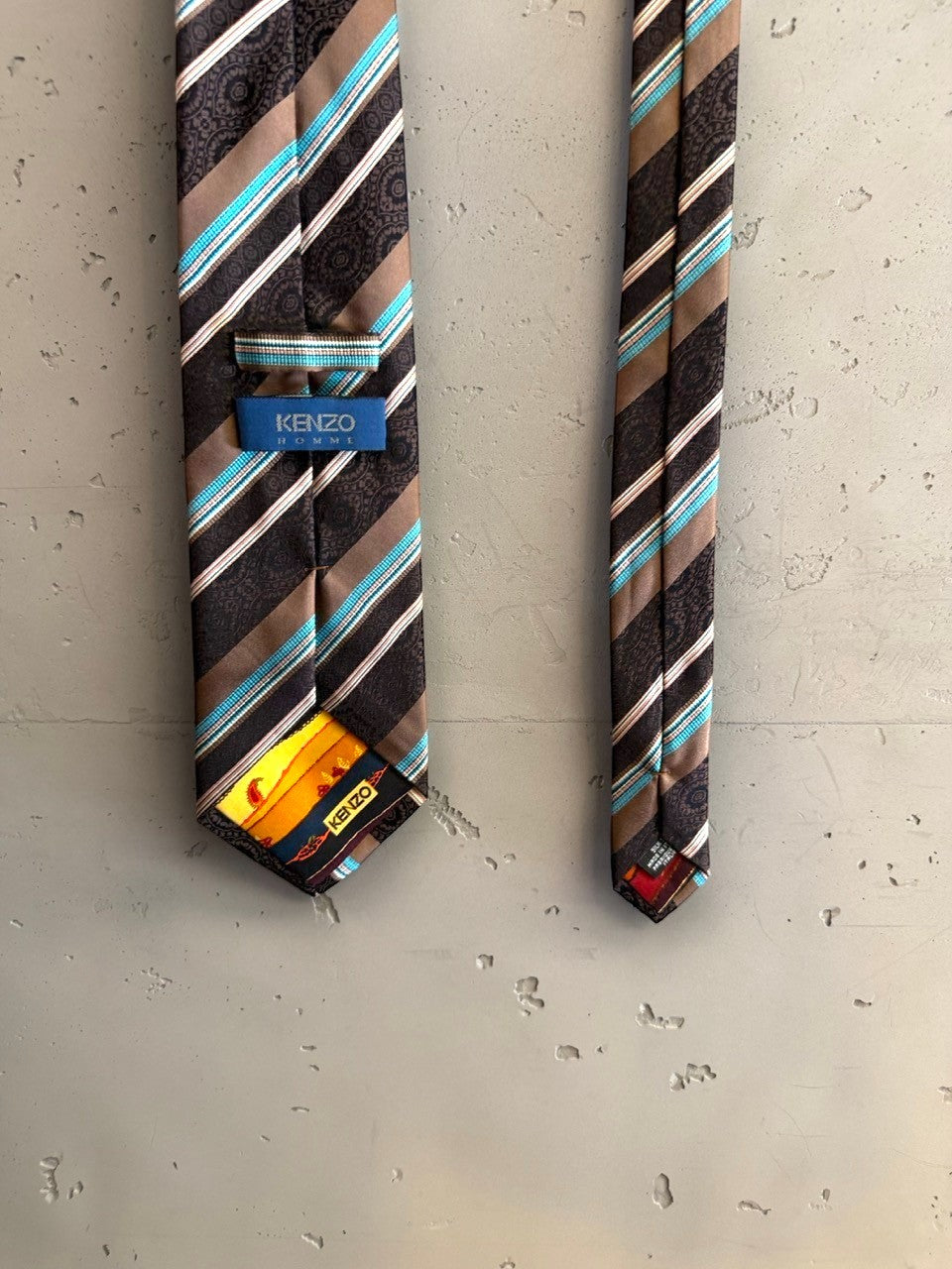 BERLIN VINTAGE CORNER brown silk tie with diagonal stripes of turquoise, white, and paisley pattern.