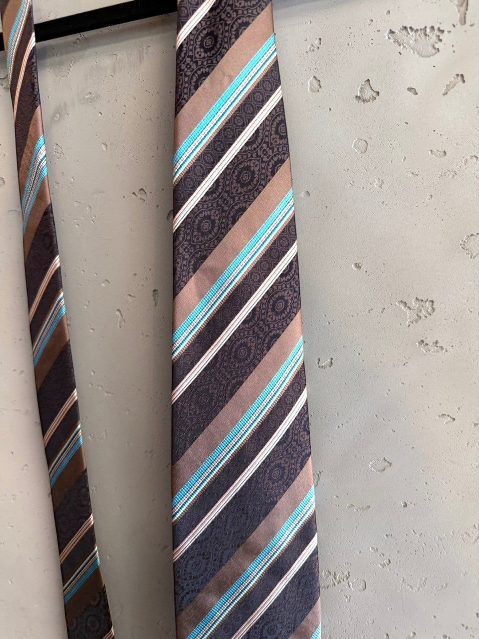 BERLIN VINTAGE CORNER brown silk tie with diagonal stripes of turquoise, white, and brown with paisley motif.