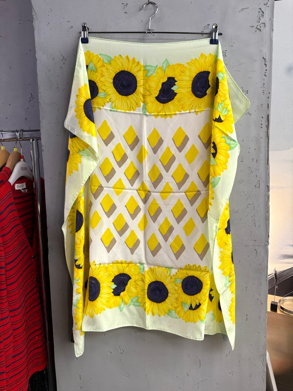 BERLIN VINTAGE CORNER silk scarf with yellow sunflower border and geometric diamond pattern on pale yellow background.