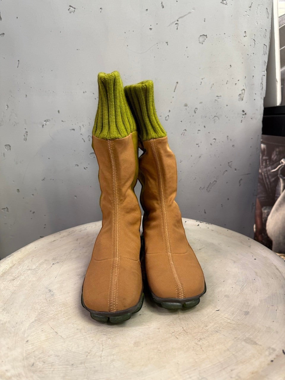 BERLIN VINTAGE CORNER mid-calf boots in tan fabric with olive green ribbed knit cuffs and segmented green outsoles.