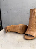 BERLIN VINTAGE CORNER tan woven leather peep-toe heeled booties with side zipper and cut-out details.