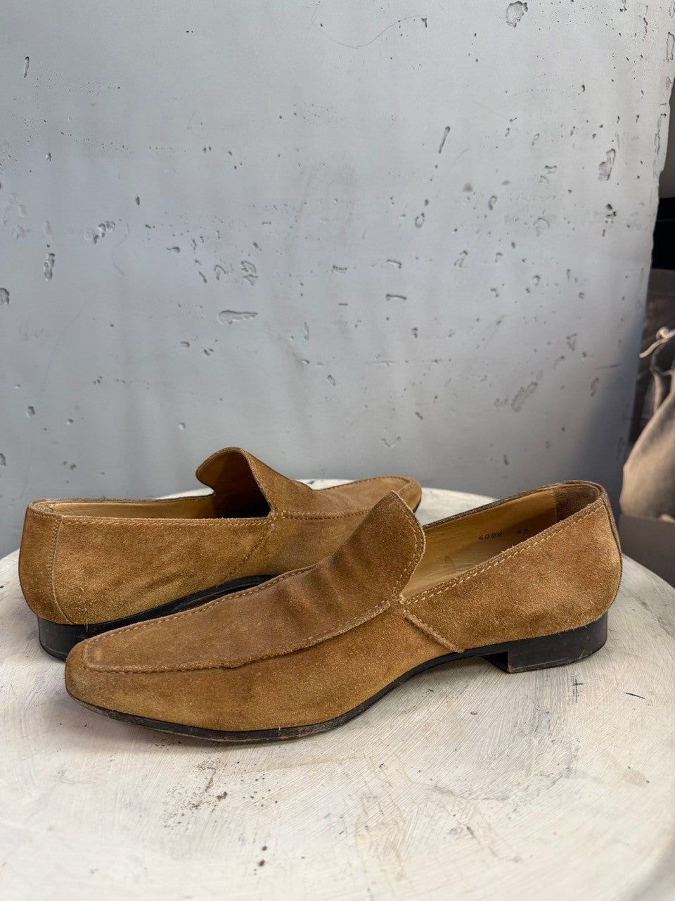 BERLIN VINTAGE CORNER tan suede slip-on loafers with a sleek silhouette and subtle stitching detail.
