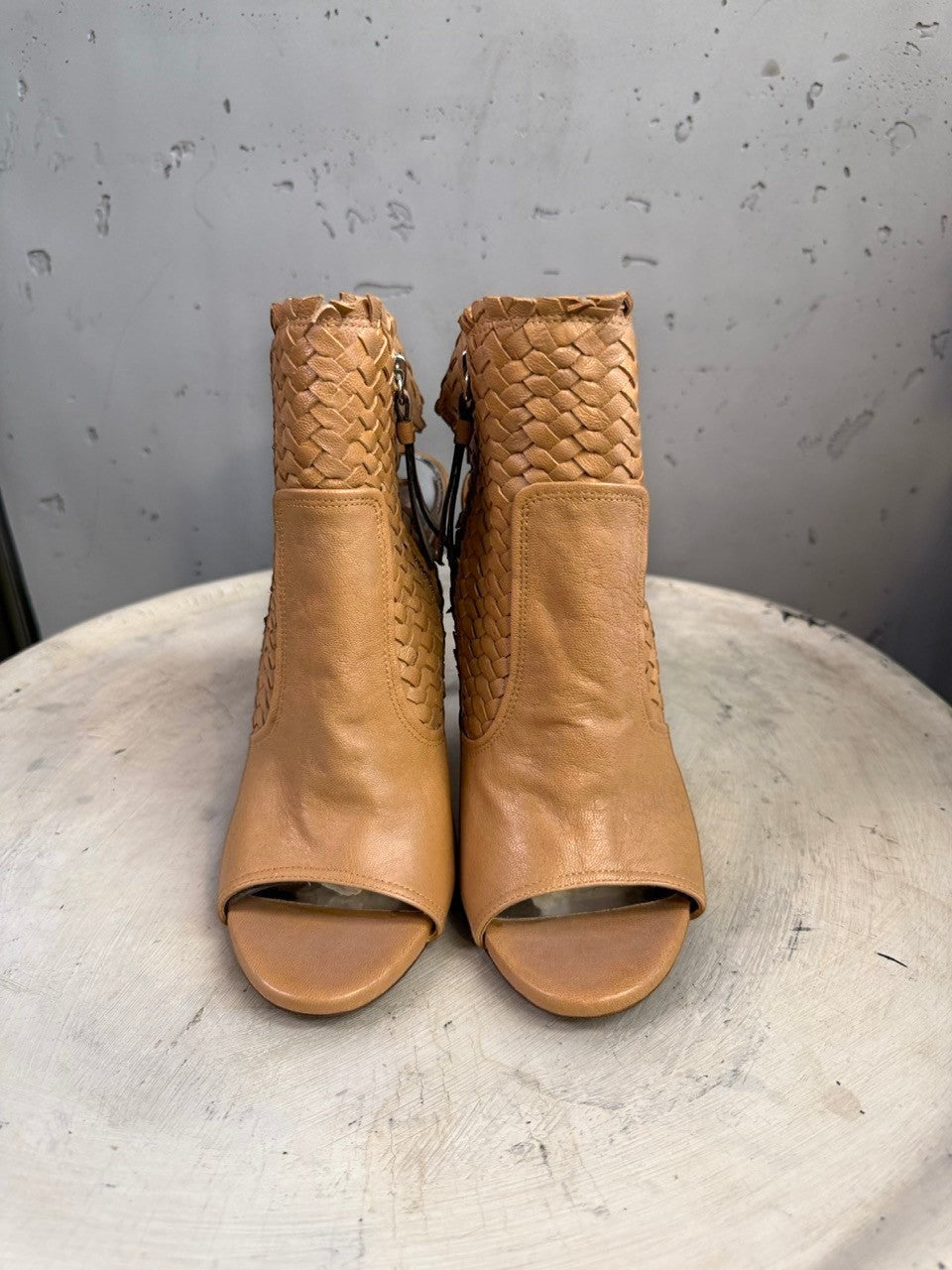 BERLIN VINTAGE CORNER tan woven leather peep-toe heeled booties with side zipper and cut-out details.