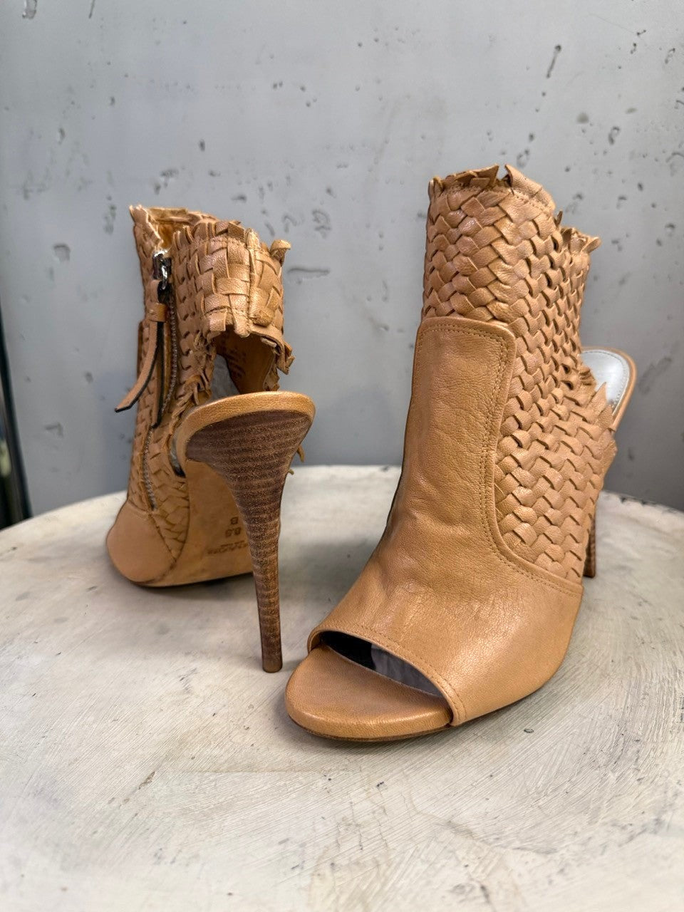 BERLIN VINTAGE CORNER tan woven leather peep-toe heeled booties with side zipper and cut-out details.