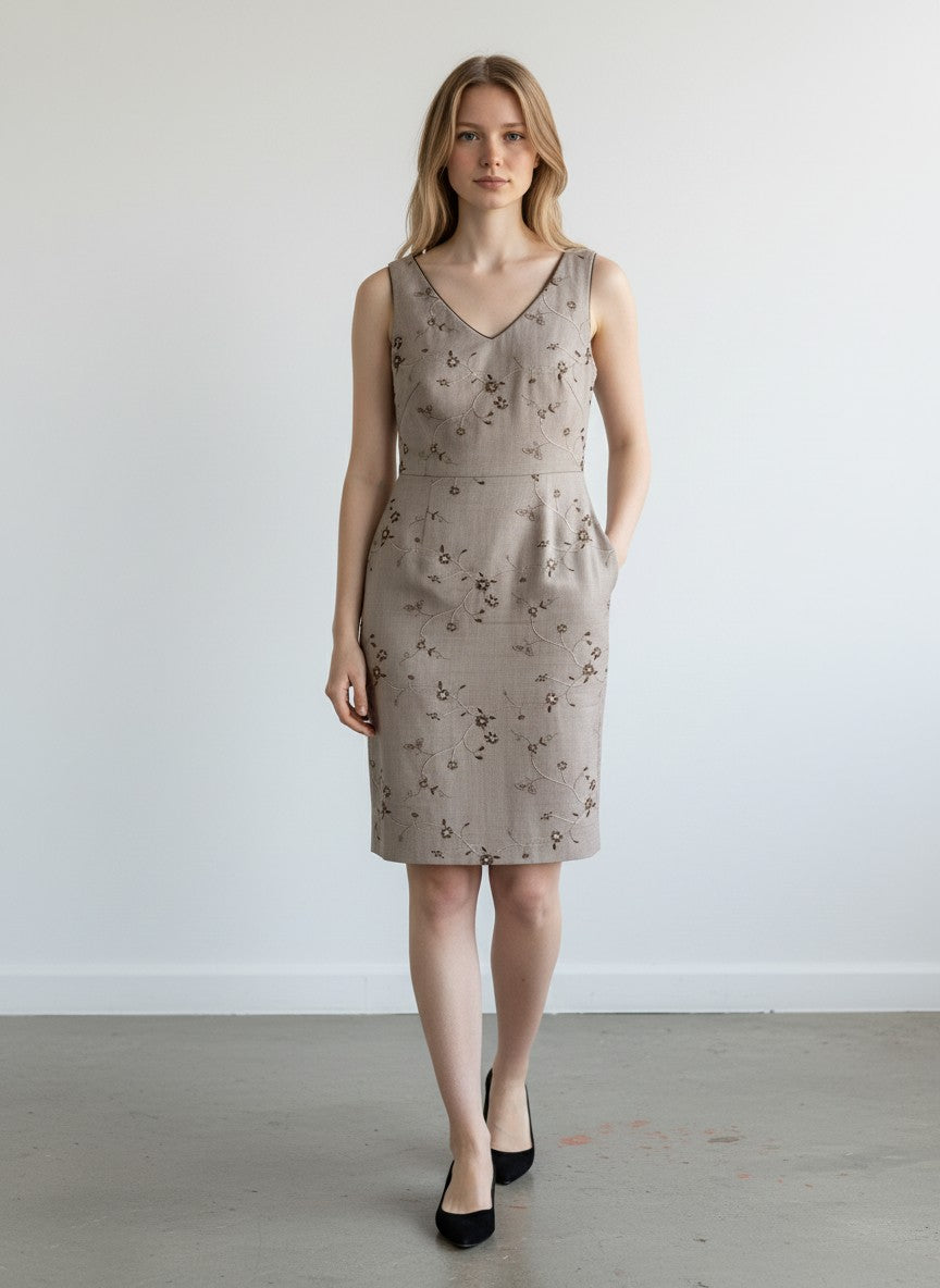 BERLIN VINTAGE CORNER taupe textured sheath dress with all-over floral embroidery, V-neck, sleeveless design, and hidden back zipper.