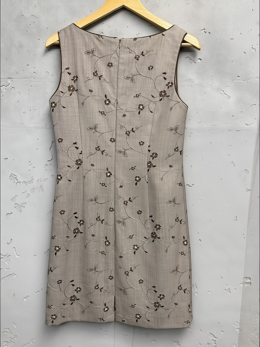 BERLIN VINTAGE CORNER taupe textured sheath dress with all-over floral embroidery and V-neckline.