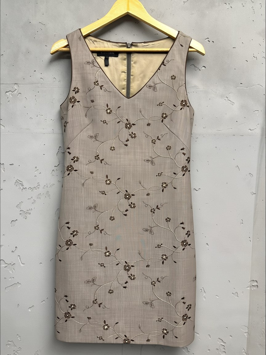 BERLIN VINTAGE CORNER taupe textured sheath dress with all-over floral embroidery, V-neckline, and sleeveless design.