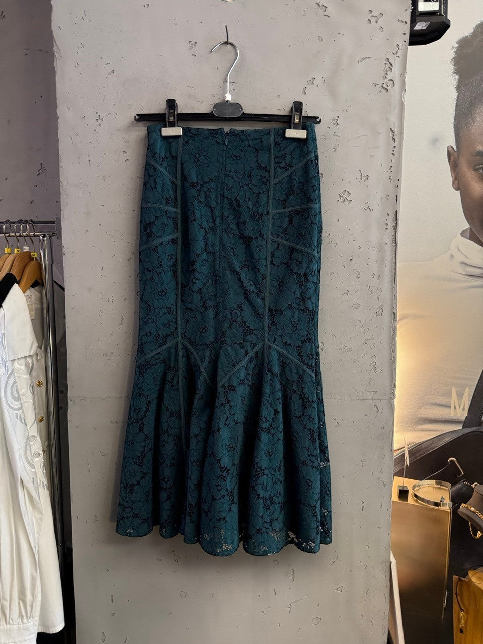 BERLIN VINTAGE CORNER teal lace mermaid midi skirt with floral pattern and paneling detail.