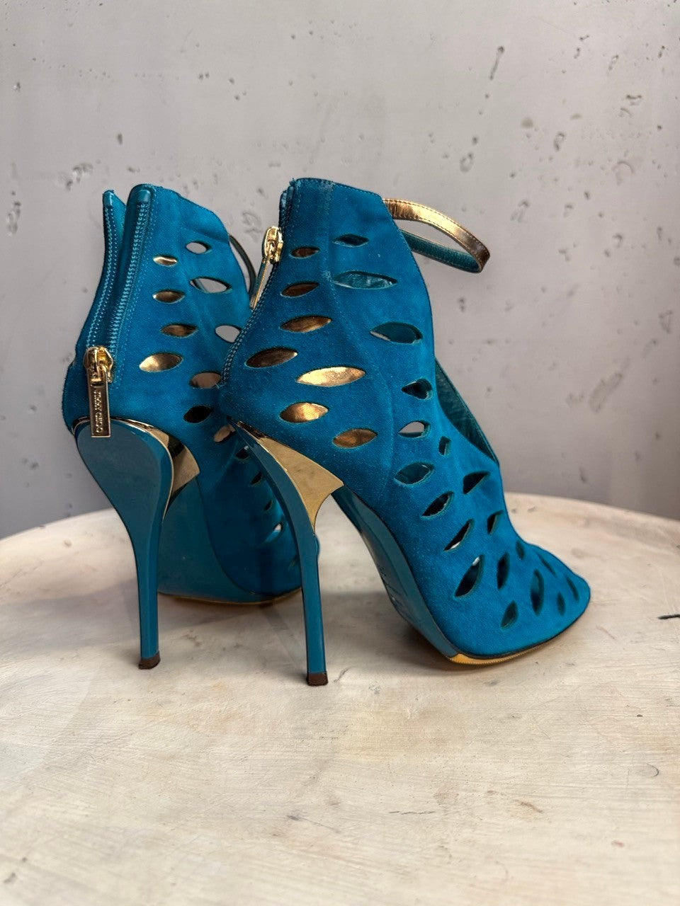 BERLIN VINTAGE CORNER teal suede Jimmy Choo peep-toe booties with laser-cut details and gold stiletto heels.