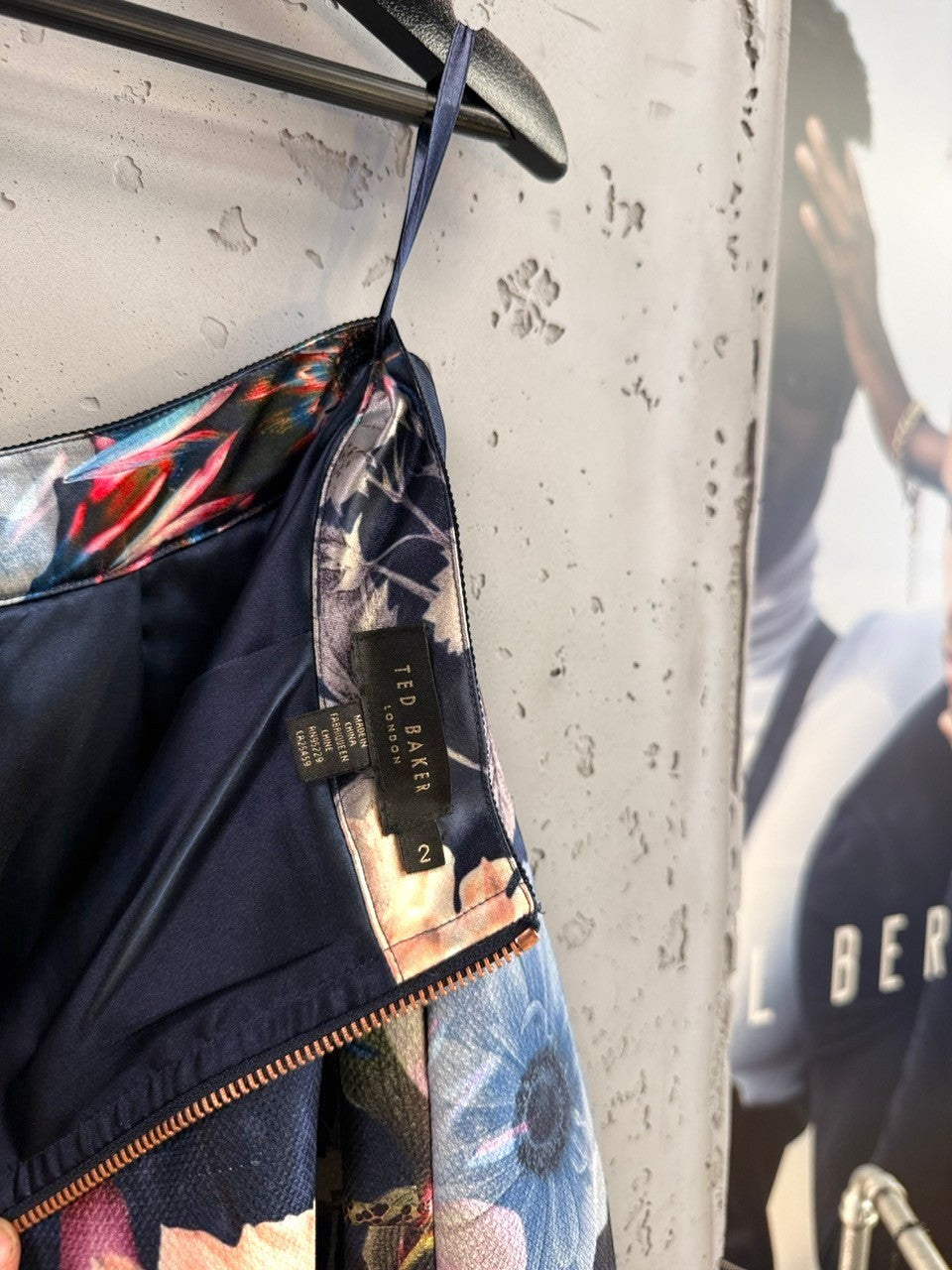 BERLIN VINTAGE CORNER Ted Baker floral print skirt with navy background and metallic back zipper detail