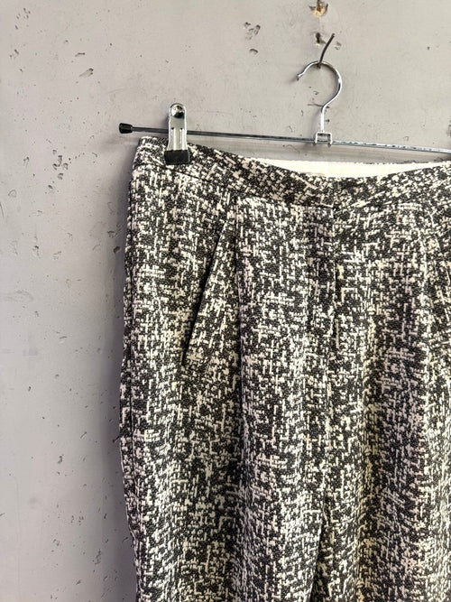 BERLIN VINTAGE CORNER tailored trousers in black and white abstract textured fabric with front pleats and pockets.