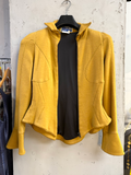 BERLIN VINTAGE CORNER Thierry Mugler mustard wool jersey peplum jacket with front zip.