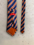 BERLIN VINTAGE CORNER Tino Cosma navy blue silk necktie with orange and white diagonal stripes and orange tipping