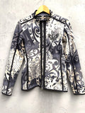 BERLIN VINTAGE CORNER grey, black, and cream tribal print zip-up jacket with embroidered chest detail and stand-up collar.
