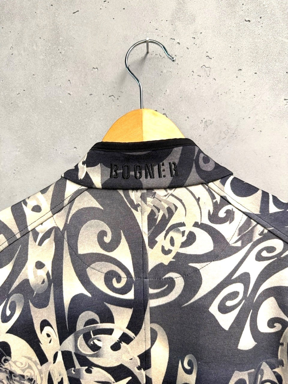 BERLIN VINTAGE CORNER grey, black, and cream tribal print zip-up jacket with stand-up collar and embroidered logo.