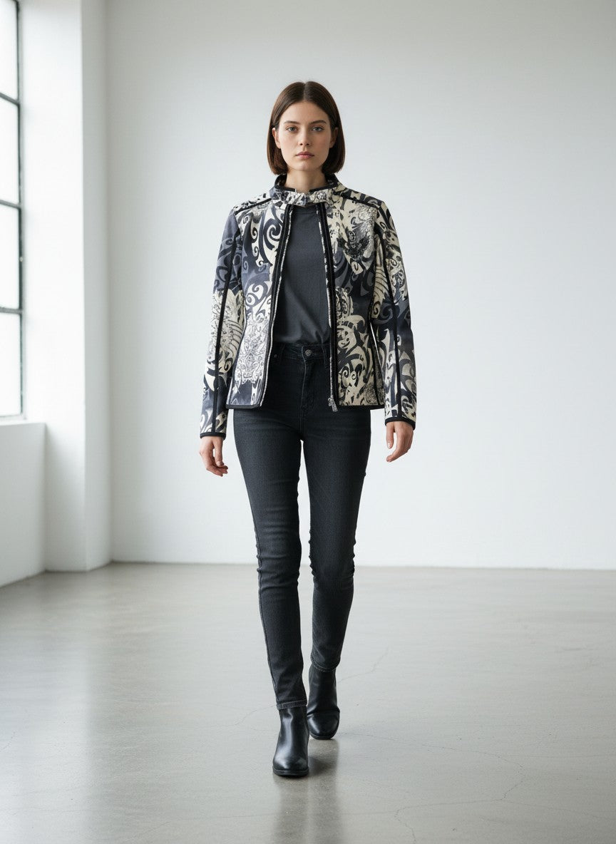 BERLIN VINTAGE CORNER grey, black, and cream tribal print zip-up jacket with embroidered chest detail and stand-up collar.