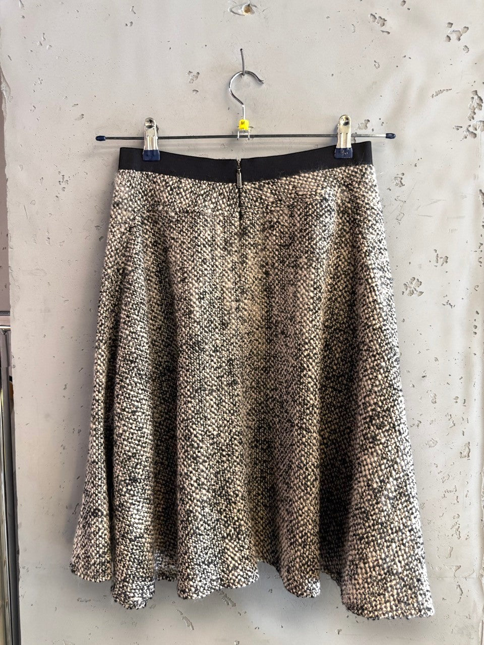 BERLIN VINTAGE CORNER black and cream marled tweed A-line skirt with black waistband and back zipper.